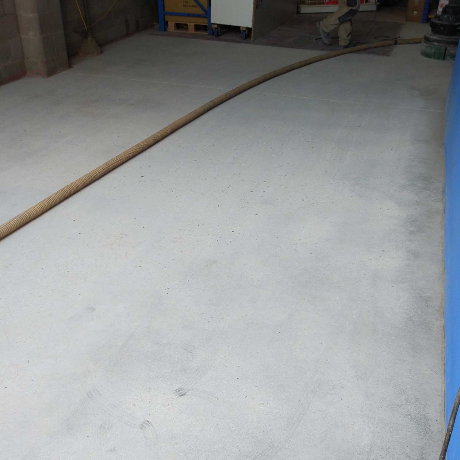 Commercial Indoor Epoxy Removal by Burke Concrete Resurfacing
