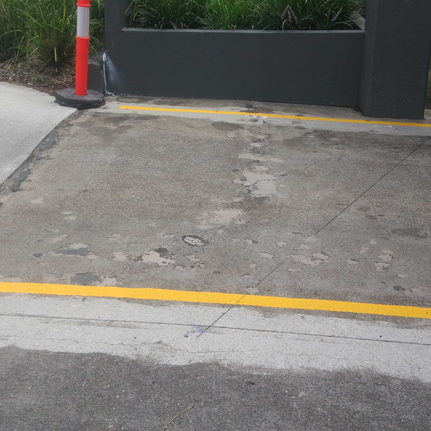Carpark Space Concrete Grinding in Indooroopilly Shopping Centre by Burke Concrete Resurfacing